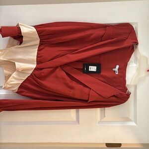 Orange body suit long sleeve shirt